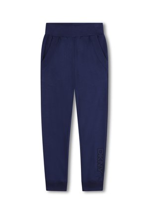 Pantalons de survêtement bleu marine en tissu doux, avec une taille élastique, des poches latérales et un logo DKNY en impression tonale sur la jambe gauche.
