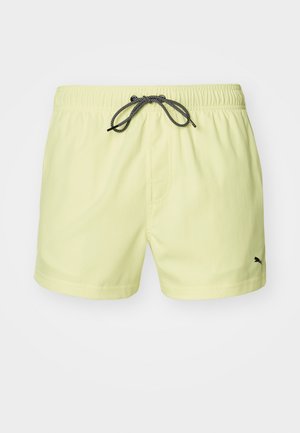 Helles Gelbes Schwimmshorts mit elastischem Bund und schwarzem Kordelzug. Verfügt über seitliche Taschen und ein kleines schwarzes Logo am unteren Saum.