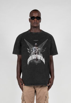 Black cotton t-shirt featuring a graphic print of a winged figure and text, short sleeves, and a crew neckline. Casual fit.