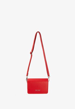 Red leather crossbody bag with a textured finish, rectangular shape, adjustable strap, and silver hardware featuring brand logo.
