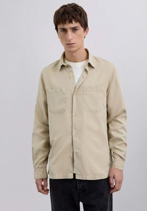 Chaqueta fina - beige
