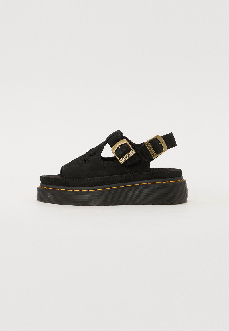 Sandale platforme din suede negru, cu vârf deschis, design cu decupaje, două catarame ajustabile și cusături galbene pe talpa groasă.