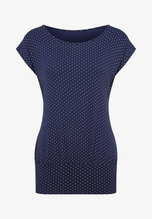 Navy blue polka dot top with short sleeves, round neckline, soft fabric, and a fitted design. Features small white dots evenly spaced.