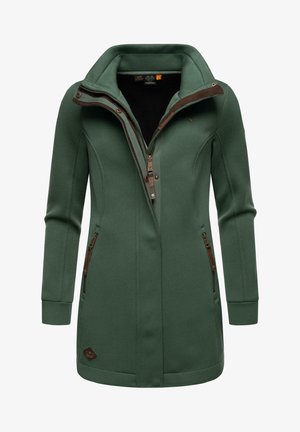 Green long-sleeve coat with a high collar, featuring dual side zippers, a central zipper, and brown hardware accents. Textured fabric design.