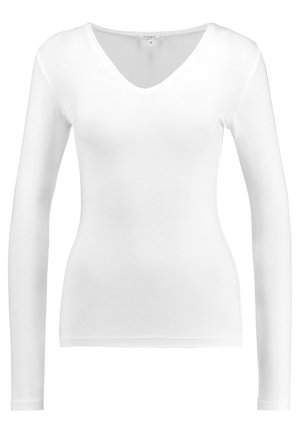 Bílý dlouhý rukáv top s výstřihem do V vyrobený z hladké, lehké látky; obtáhnutý střih bez dalších vzorů nebo kovových detailů.