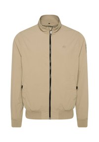 Beige lightweight bomber jacket with a high collar, black zipper, ribbed cuffs, and hem. Features side pockets and a subtle logo on the chest.