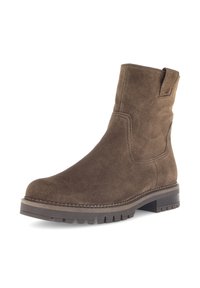 Brune ruskind ankle støvler med en rund tå, kort skaft og tekstureret gummisål. Karakteriseret ved side-syninger og en pull-tab øverst.