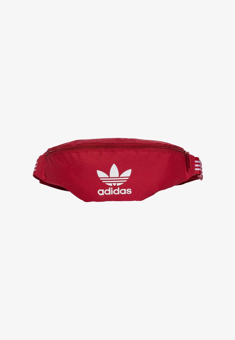 Red fanny pack made of durable fabric featuring a zippered closure, white Adidas logo, and white three-stripe accents on the adjustable strap.