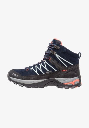 Mid-cut waterproof hiking boots in navy blue with grey and coral accents. Features textured fabric, metal eyelets, and rubber sole.
