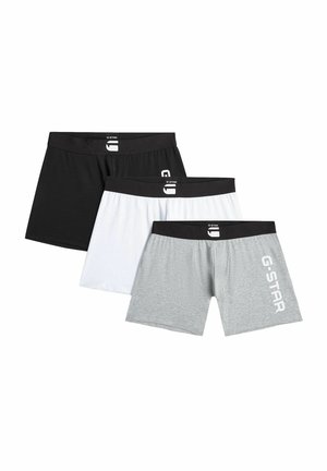 Tre par herreboxershorts i sort, hvid og grå med sorte taljebånd; det grå par har "G-STAR" logo på venstre lår.