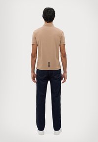 EA7 Emporio Armani TRAIN CORE - Polo marškinėliai - portabella