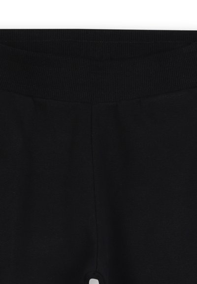 Zwarte leggings met een brede, geribbelde tailleband en een gladde, zachte textuur. Heeft een strak ontwerp zonder zichtbare hardware of patronen.