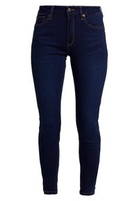 Jeans ajustados de denim azul oscuro, con cintura alta, diseño de cinco bolsillos, costuras naranjas en contraste y una textura suave.