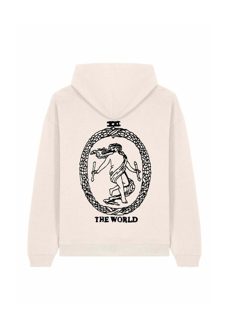 Lichtbeige hoodie met een zwart grafisch ontwerp van een figuur in een ovaal, omgeven door een decoratieve rand, met de tekst "DE WERELD."