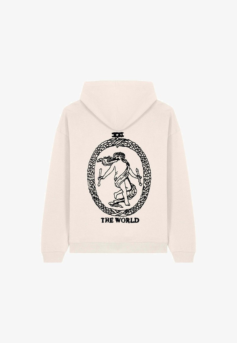 Hoodie color beige chiaro con una grafica nera di una figura all'interno di un ovale circondata da un bordo decorativo, con testo che recita "IL MONDO."