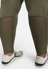 Nike Performance PLUS - Leggings - medium olive/black