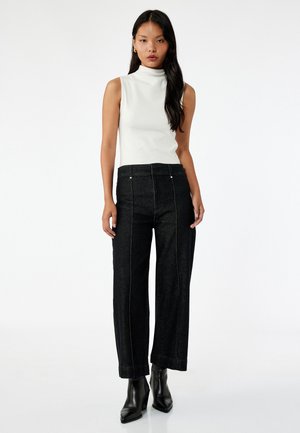 CULOTTE - Flared Jeans - black