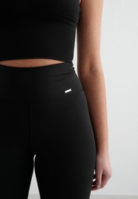 aim’n® Legíny – nohavice - black