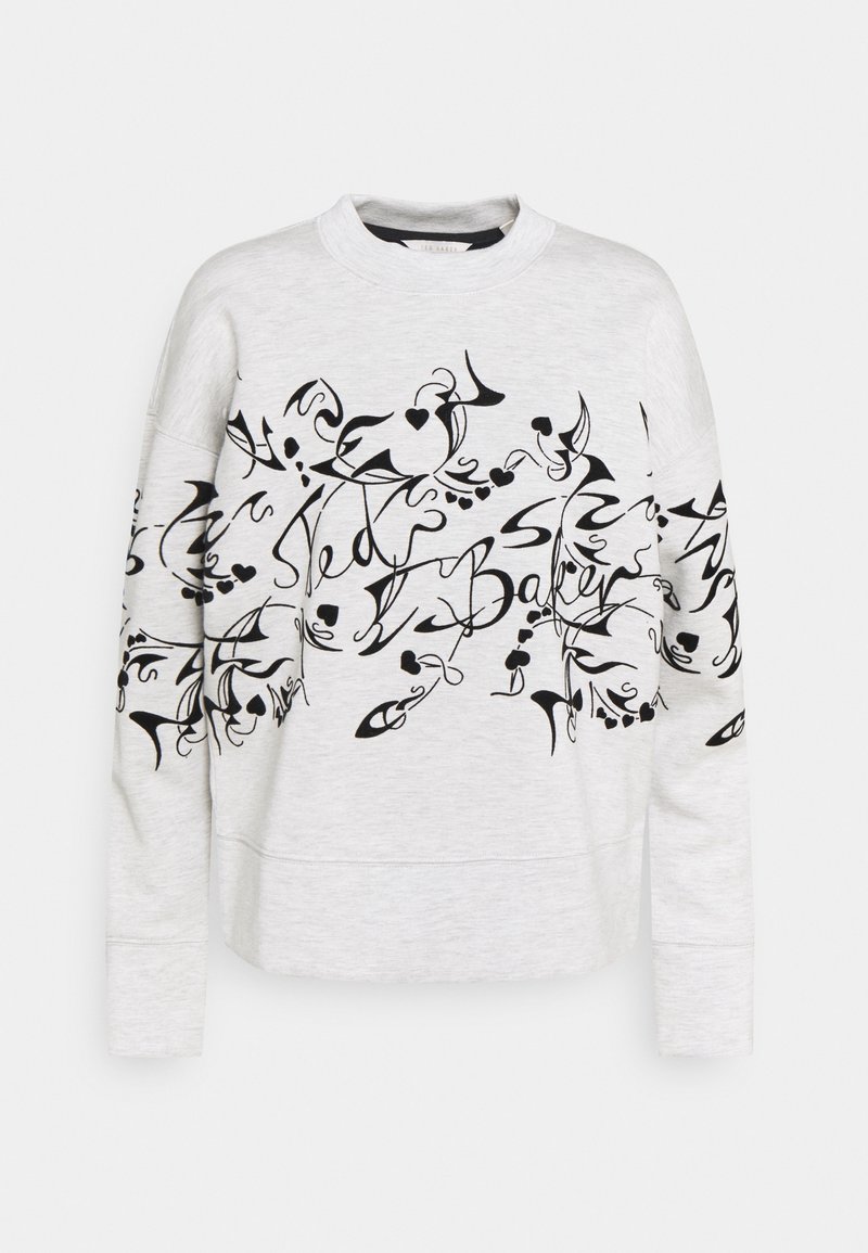 Sweat-shirt gris clair à manches longues avec un motif abstrait noir de fleurs et de cœurs, et l'inscription "Ted Baker" en script sur le devant et les manches.