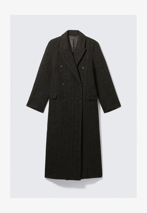 Manteau croisé en tweed à chevrons foncé, avec un col cranté, deux poches avant et des manches longues.