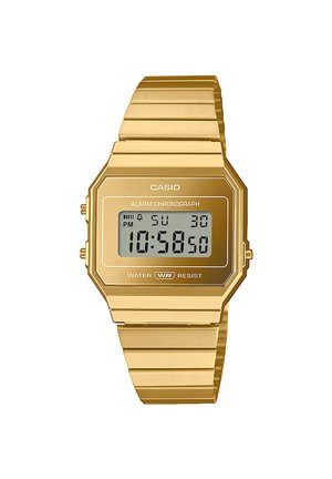 Ψηφιακό ρολόι Casio με οκταγωνιαία χρυσή μεταλλική θήκη και μπρασελέ, που διαθέτει ψηφιακή οθόνη, ξυπνητήρι, χρονόμετρο και αντοχή στο νερό.