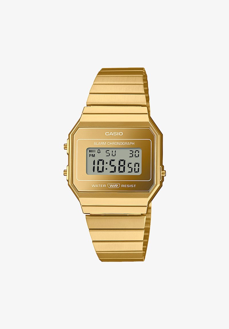 Orologio digitale Casio con cassa e bracciale in acciaio inossidabile placcato oro a forma ottagonale, dotato di display LCD, sveglia e resistenza all'acqua.