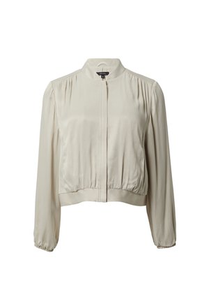 Gekürzte, langärmelige Jacke aus leichtem beigen Satin. Verfügt über einen Stehkragen, geraffte Schultern und elastische Bündchen mit einem Reißverschluss vorne.