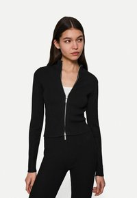 Bershka Vesta na kopčanje - black