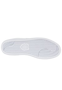 Sohle eines Sneakers aus weißem Gummi material, mit strukturiertem Muster und Details in Fischgrät- und Kreisform, ausgelegt für Traktion.