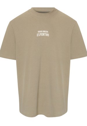 Camiseta beige de cuello redondo y mangas cortas con texto blanco "GOLDEN HORIZON EXPEDITION" centrado en el pecho.