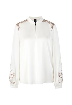 Weiße Bluse mit langen Ärmeln, verziert mit brauner Blumenstickerei auf den Schultern, Stehkragen und leicht gerafften Ärmeln für eine lockere Passform.