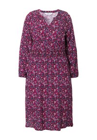 Vestido púrpura de manga larga con estampado de corazones, con escote en V y cintura elástica. Confeccionado en tela ligera y estampada.
