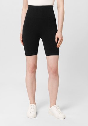 Højtaljede cykeshorts i sort bomuldsmix med ribbet tekstur, knælange, med en tætsiddende pasform og elastisk talje.