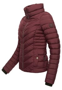 Burgundy padded jacket with a high collar, chevron stitching, metallic zipper, side pockets, and black knit cuffs.