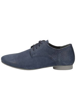 Chaussure habillée en cuir pour homme de couleur bleu marine, à lacets et talon bas gris, vue de côté extérieur.