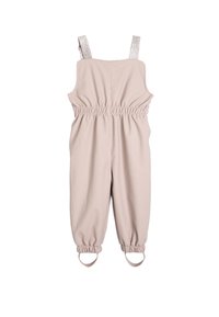 Beige overall lavet af blødt materiale med elastisk talje; har sølvglitrende skulderstropper og elastiske manchetter ved anklerne.