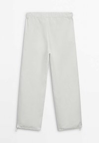 Grijze, lichte, loszittende broek met een elastische tailleband en verstelbare zoom. Glad textuur en recht-toe recht-aan ontwerp.