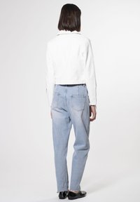 INFLUENCER BIKER - Giacca in similpelle - white