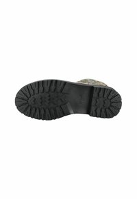 Rubber sole with deep treads for traction, featuring a black color. Design includes a textured surface for enhanced grip and durability.