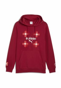 Rød hoodie med en frontlomme i kengurustil. Udstyret med hvid "suisse" tekst og mønstre med det svejtsiske kors. Lavet af blødt stof, med lange ærmer og hætte.