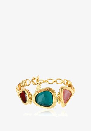 Bracelet en or avec trois grandes pierres précieuses de forme irrégulière aux tons rouge profond, sarcelle et rose clair, reliées par des maillons ovales en chaîne d’or.