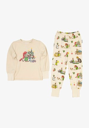 Children's pajama set in cream, featuring a long-sleeve top with a Christmas tree design and patterned pants with festive illustrations.