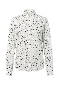 Langarmshirt in lichtcrème stof met zwarte en blauwe bloemenpatronen, knoopsluiting aan de voorkant en klassiek kraagontwerp.