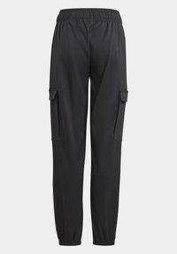 Black cargo pants made of soft fabric, featuring an elastic waistband and two side pockets. Tapered ankles with elastic cuffs.