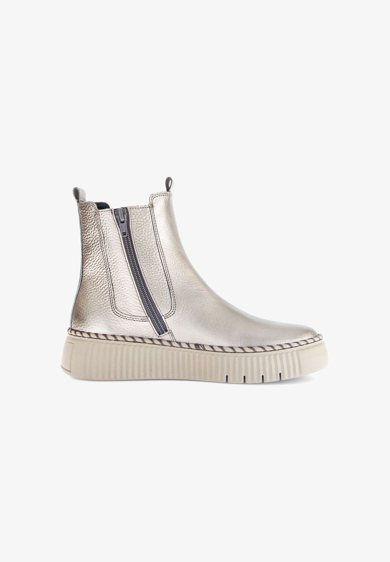Metallic silver ankle boots with a rounded toe, side zippers, and a textured upper. Features a lightweight, ridged beige sole.