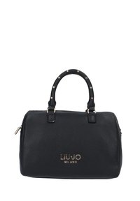 Black leather handbag with gold-tone hardware, rounded handles featuring decorative studs, and embossed logo on the front. Zipper closure.