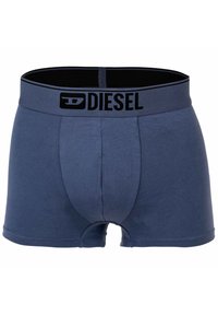 Dunkelblaue Baumwoll-Boxershorts mit einem schwarzen elastischen Bund, der das Logo "DIESEL" in fetten Buchstaben trägt. Weiches, tailliertes Design mit kurzer Beinlänge.