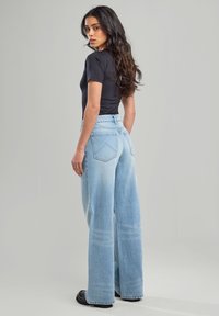 America Today RELAXED FIT - Relaxed fit jeans - medium used