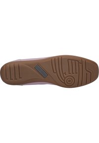Pink rubber shoe sole with textured brown tread design. Features a rectangular logo patch marked "Josef Seibel" near the heel.