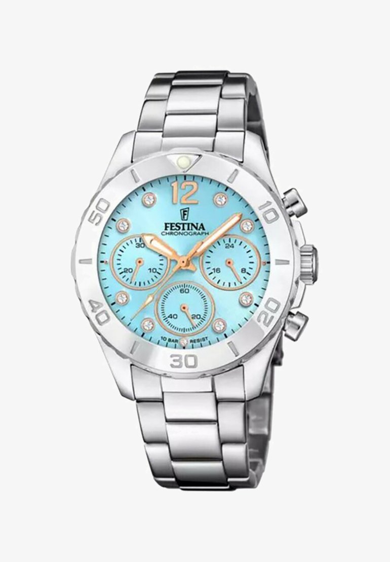 Sudraba nerūsējošā tērauda hronogrāfa pulksteņi ar tirkīza ciparnīcu, trim subciparnīcām, kristāla akcentiem un izteiksmīgiem zelta stundu rādītājiem.